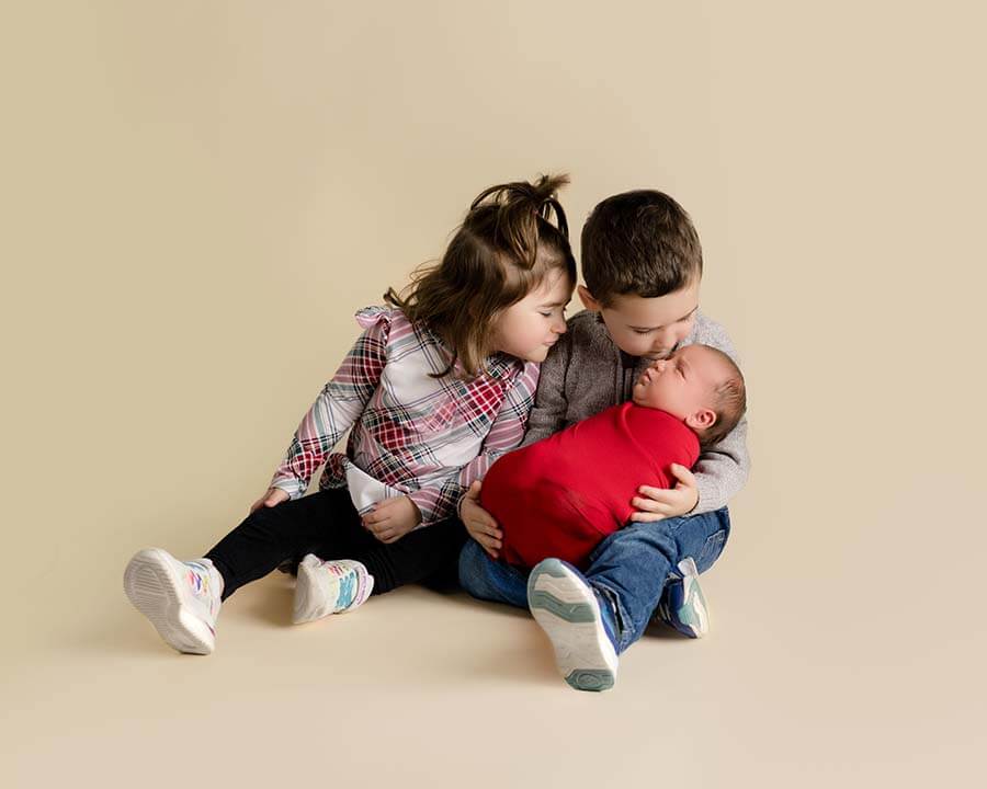 Ohio kids holding baby